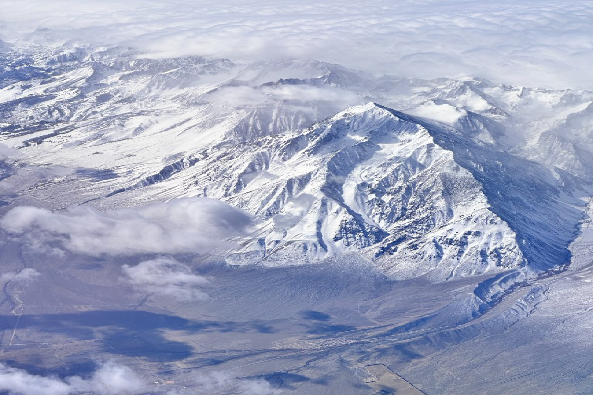 Snow-covered mountain range seen from above