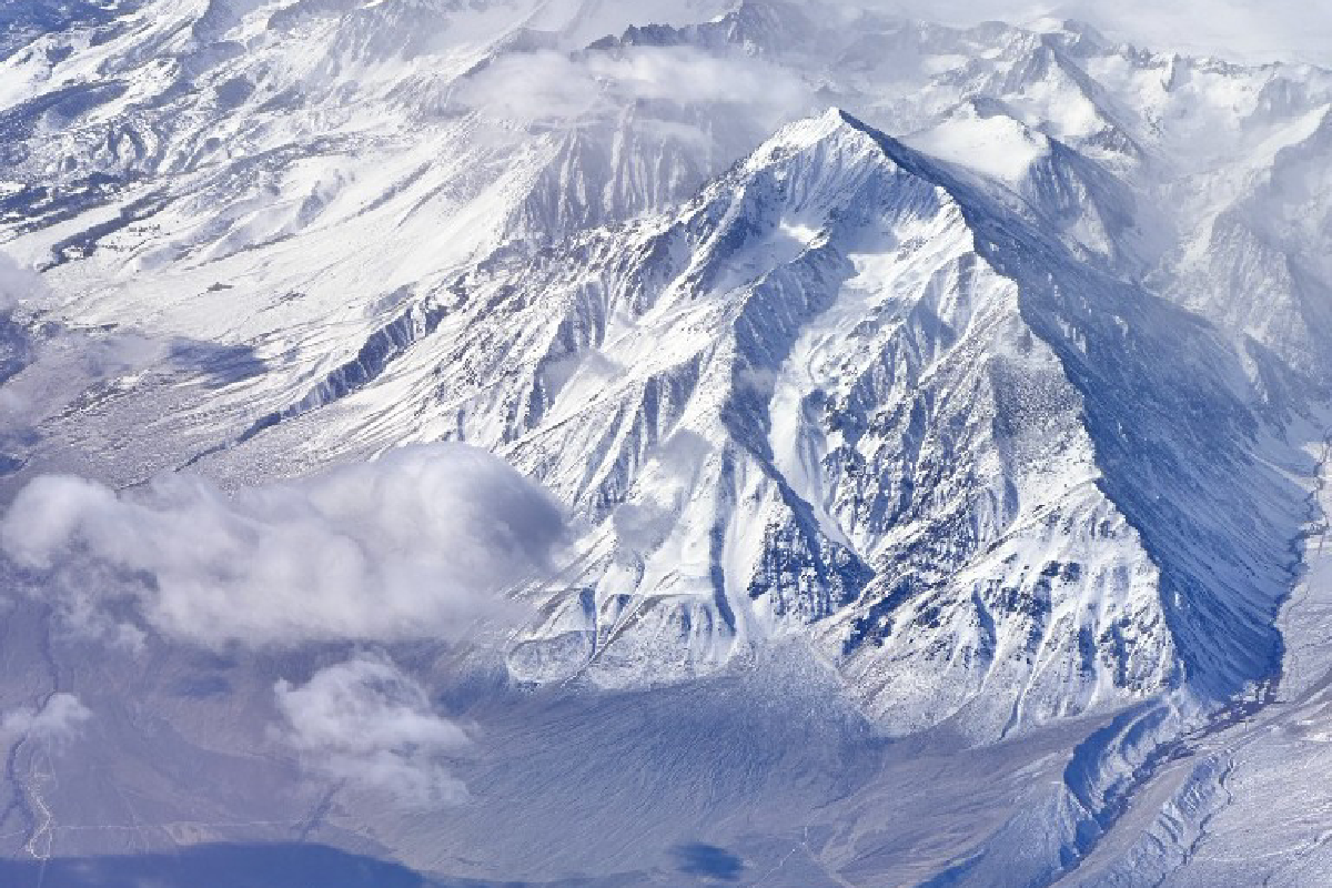 Snow-covered mountain range seen from above